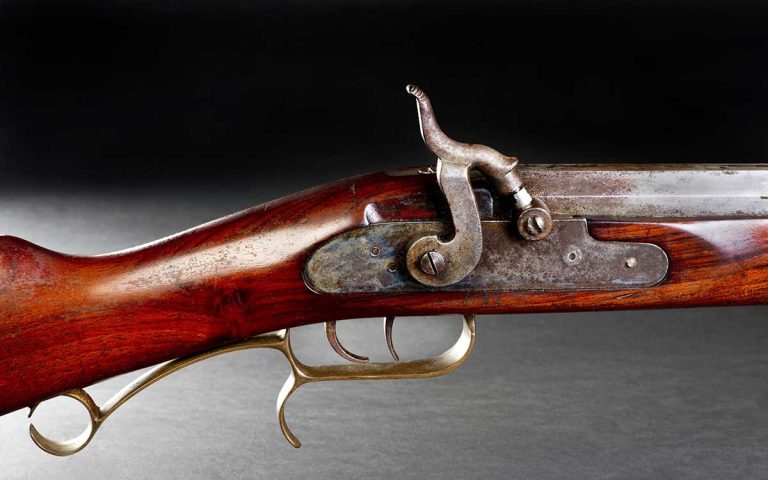Old black powder cap and ball double trigger rifle