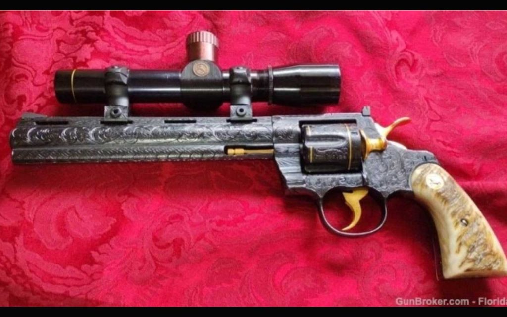 1981 Colt Python Hunter 8'' Engraved by Flannery. Find it on GunBroker.com