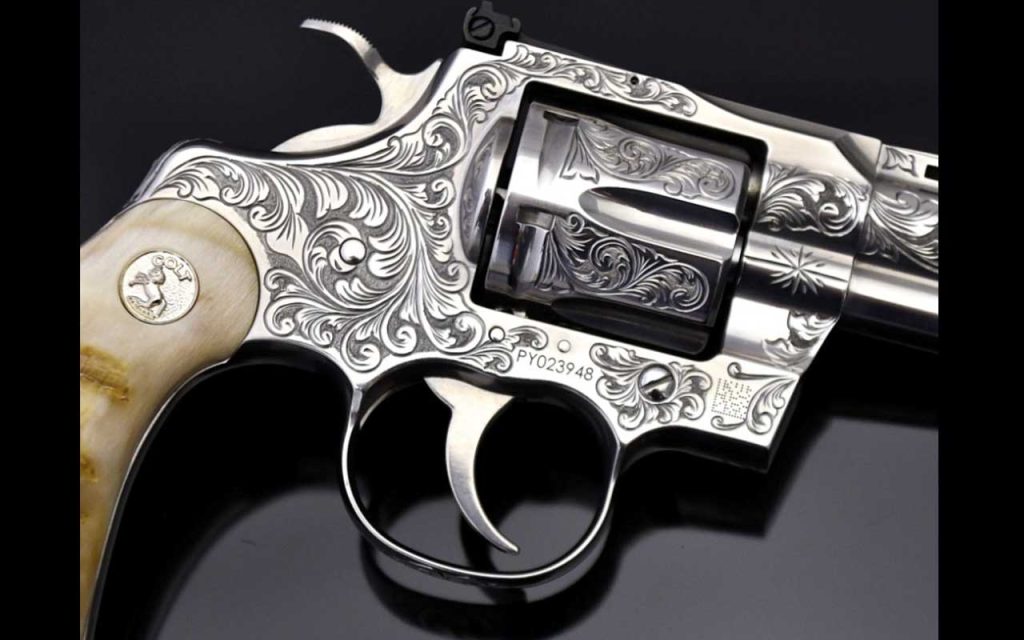 Colt Python Engraved 4" .357 Mag Featuring Ram's Horn Grips. Find it on GunBroker.com