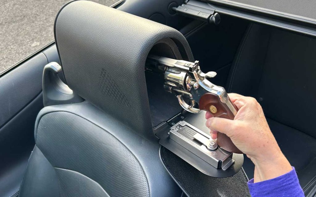 Removing a revolver from the Headrest Safe
