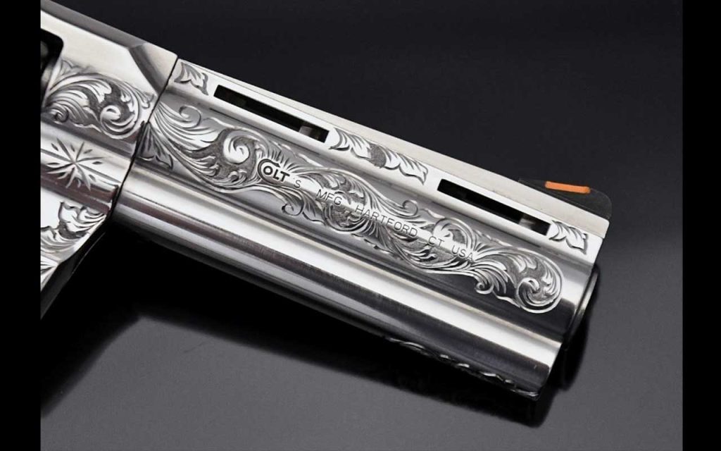 Colt Python Engraved 4" .357 Mag Featuring Ram's Horn Grips. Find it on GunBroker.com