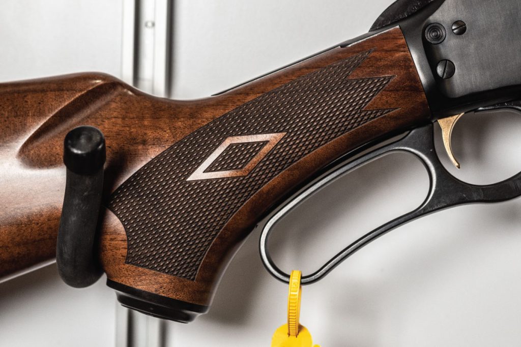 Marlin Model 336 Classic features a pistol grip with gold trigger . GunBroker.com