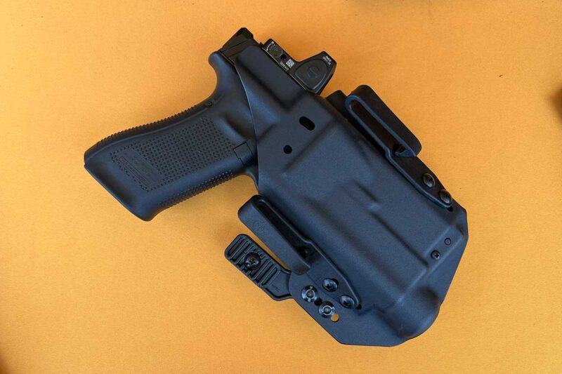 Glock pistol with Streamlight enclosed in the Mission First Tactical Pro Series Holster