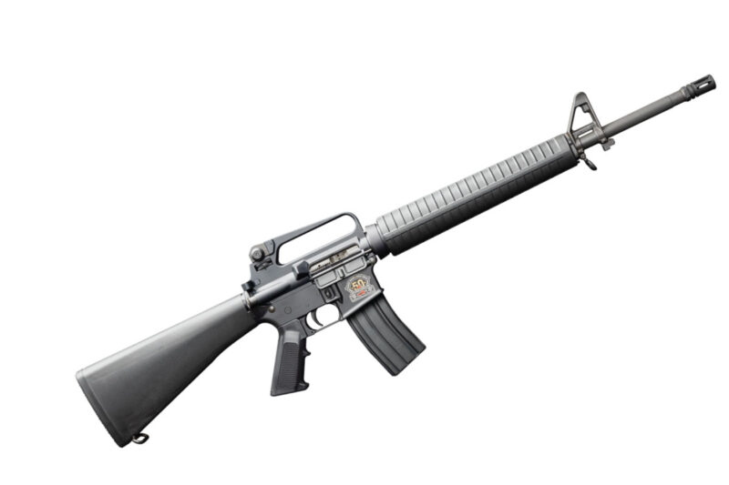 Bushmaster XM15A2 50th Anniversary rifle, a throwback to the original model, when sights were made of iron and were part of the carry handle. GunBroker.com