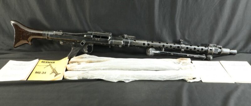 GunBroker Item #1063838730, Fully Transferable MG 34 8mm 24” Full Auto Rifle WWII MG34 w/Bipod 4Barrels was sold for $48,025.00 on 9/15/2024