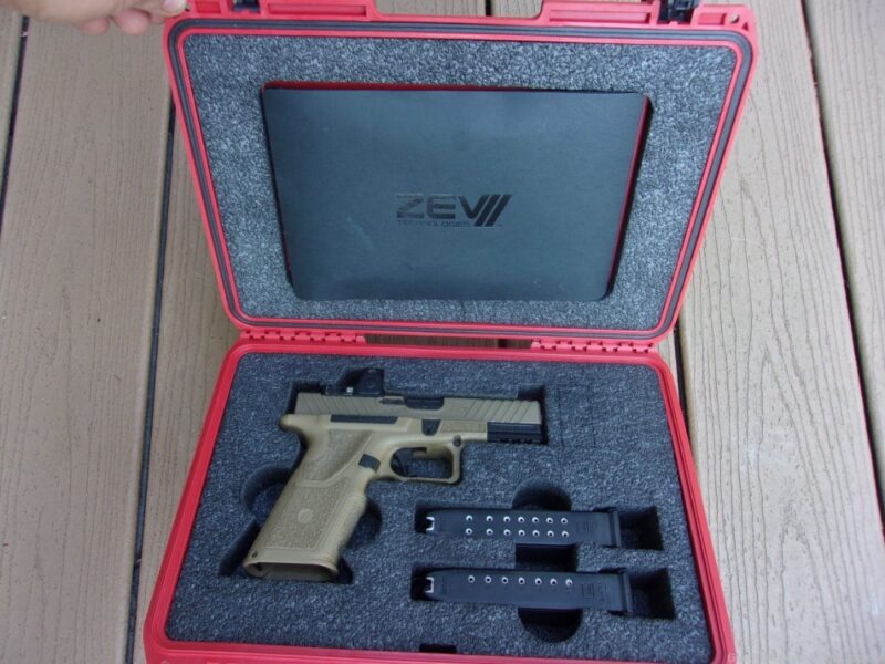 Top 24 Products Sold With the Highest Bid Counts on GunBroker Zev Technologies OZ9 Compact X Grip 9mm 4" Pistol w/ Trijicon Optic $1START