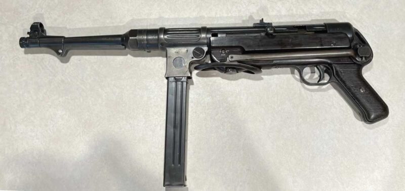 GunBroker Item #1131137047, MP38 Submachine Gun! 1940 dated, (13) mags, accessories sold for $27,000.00 on 10/11/2025