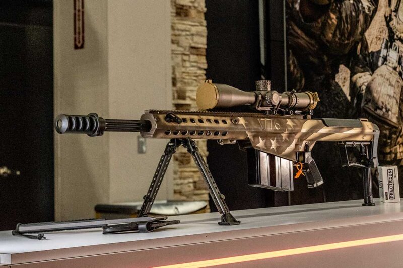 The 20-inch Barrett America 250 M107A1 Limited Edition rifles feature a custom Cerakote finish with a subdued American 1776 flag design. -GunBroker