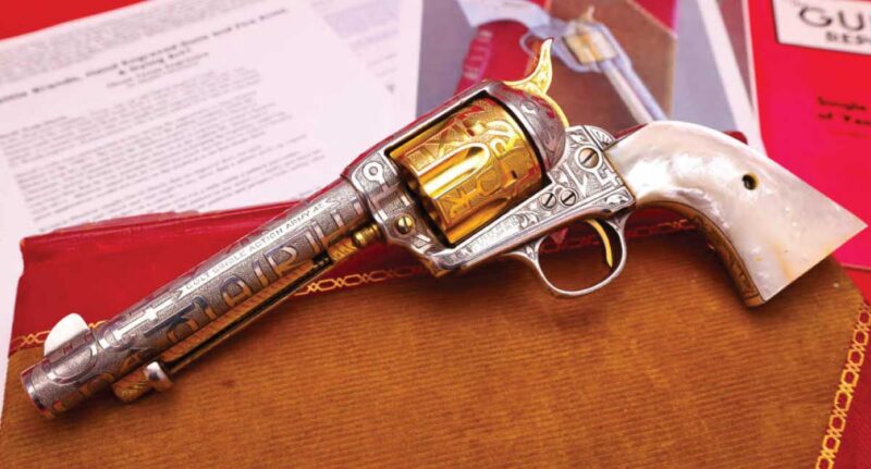 Gunbroker Item #1155697855, Weldon Bledsoe Cattle Brand Engraved 1902 Colt SAA 5.5" .45c Nickel & Gold Sold For $20,020.00 on 2/22/2026