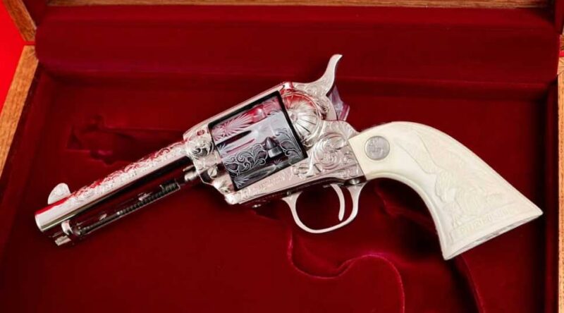 Master Engraved Colt Single Action Army .45 with Nickel and Silver Finish and Carved Ivory Grips