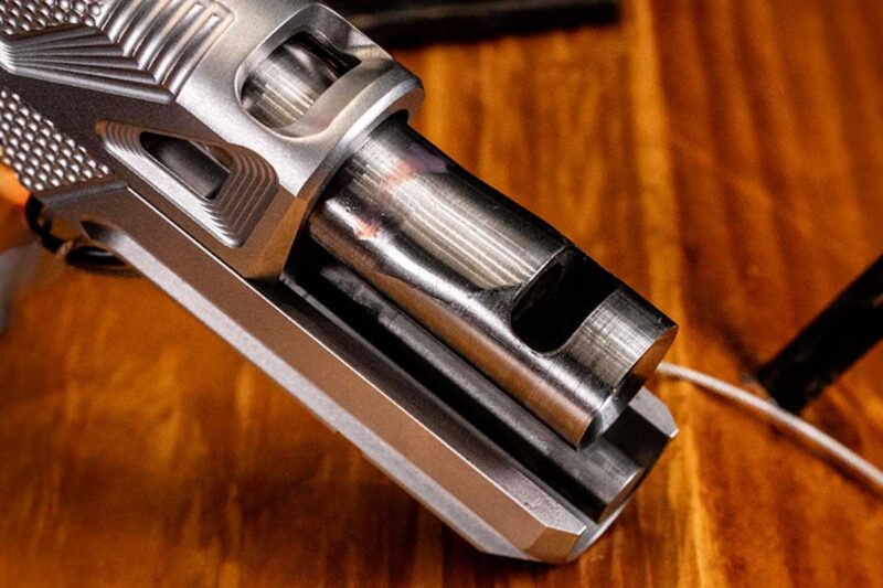 Nighthawk Custom Alpha Hawk features an integrated carry compensator for reduced muzzle rise and faster follow-up shots.