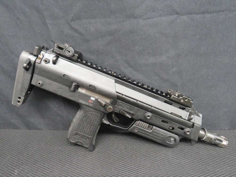 Heckler & Koch MP7 compact machine gun, a modern personal defense weapon platform.
