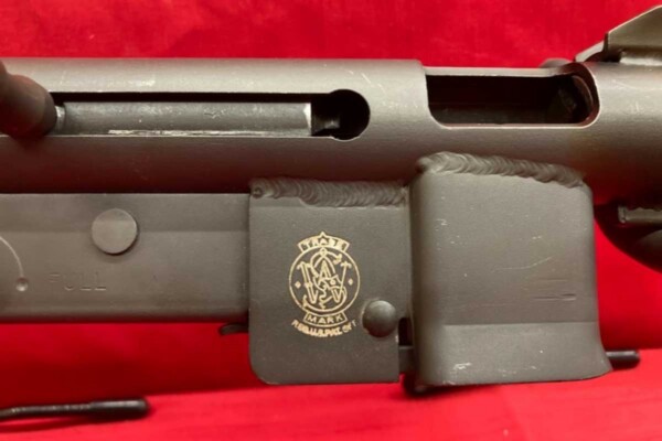 Smith & Wesson Model 76 SMG Transferable C&R 9mm SubMachine Gun with Parts - GunBroker.com Item 998574721 Smith-&-Wesson-Model-76-SMG-Transferable-C&R-9mm-sub-Machine-Gun-w-Parts-GunBroker_logo