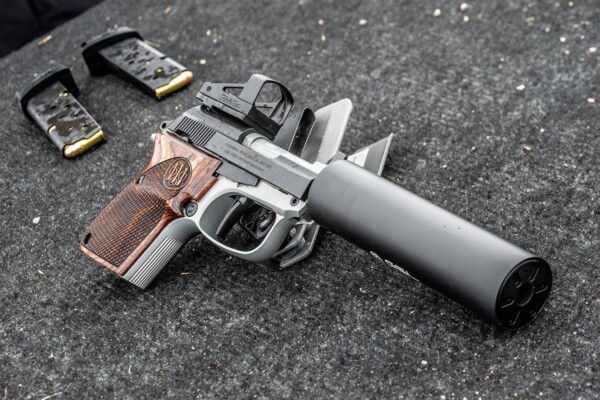 Beretta 30X Tomcat pistol with suppressor